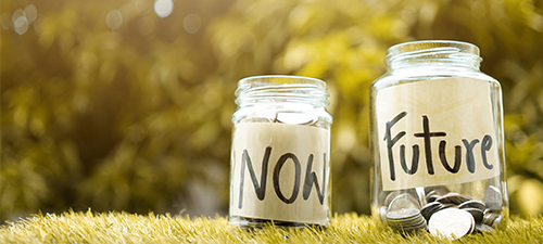 jars of coins labeled now and future